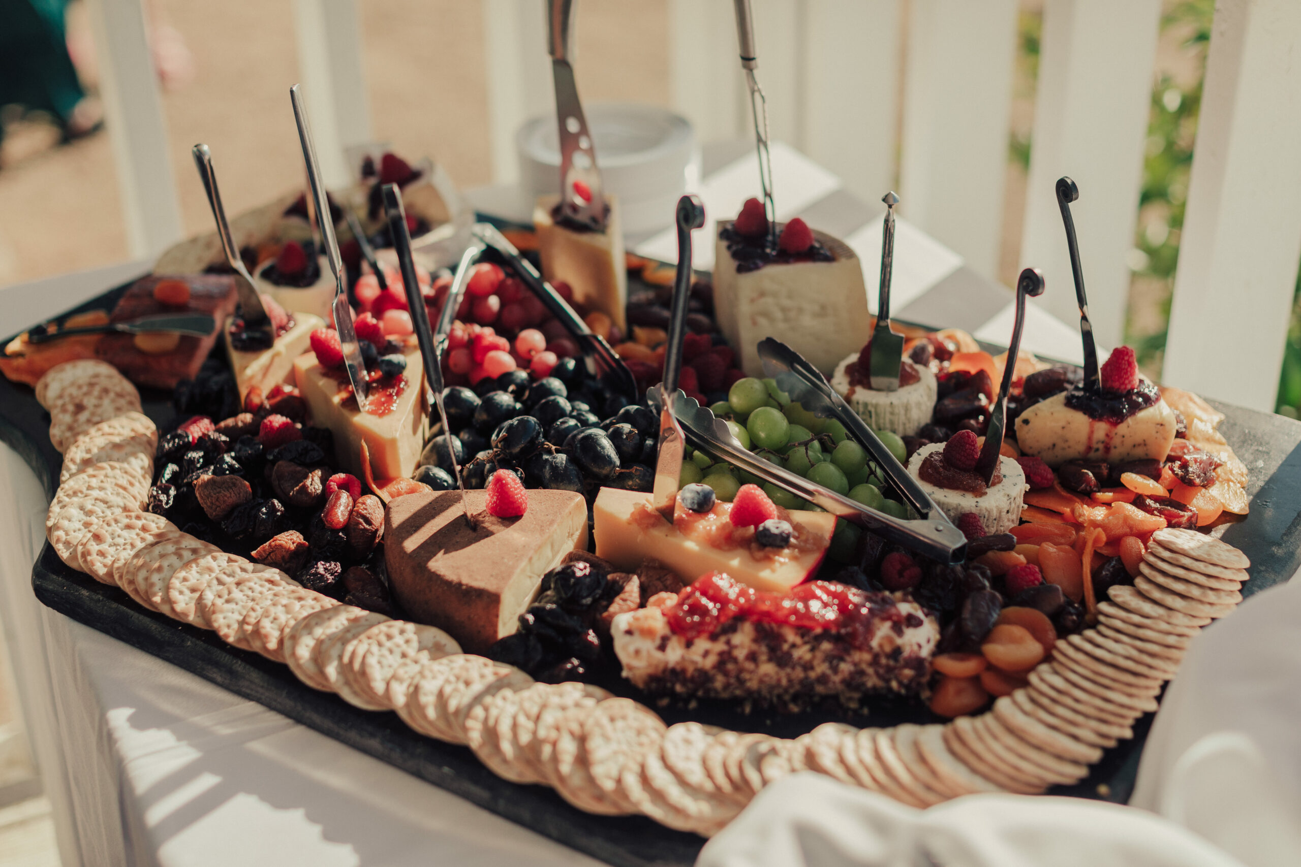 Cheese board appetizer at wedding cocktail hour on the Central Coast of California