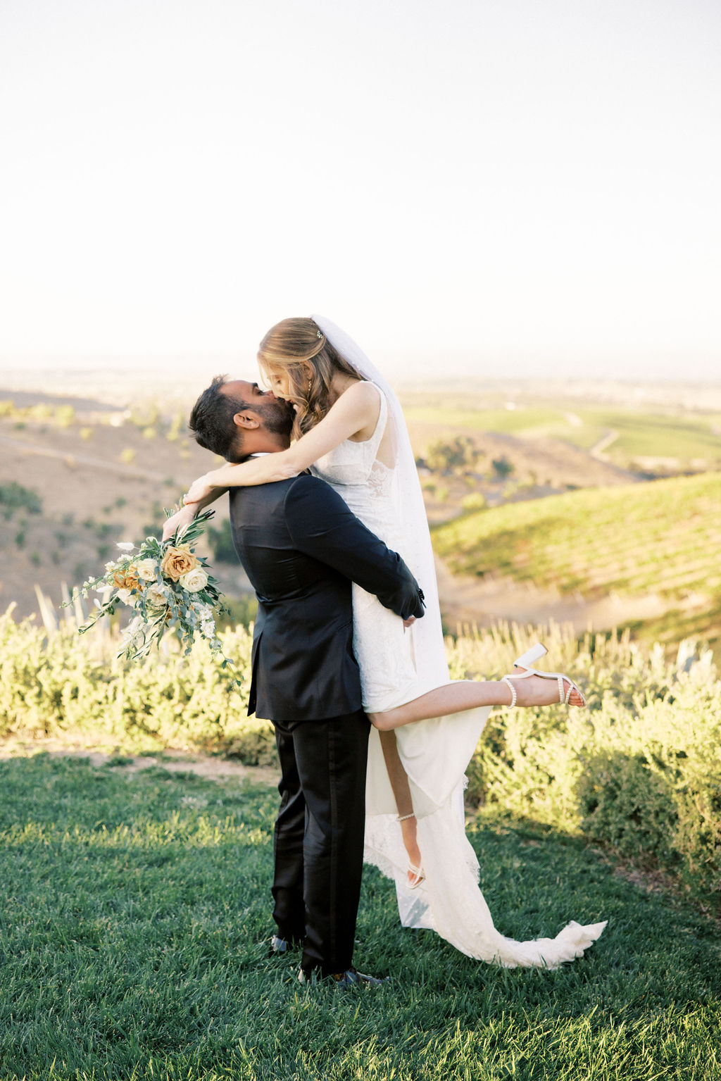 Bride and groom kiss after ceremony